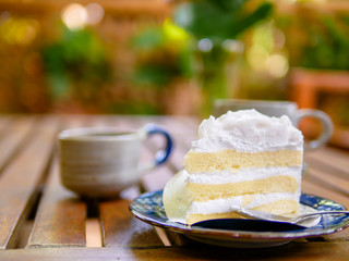 coconut cake with coffee in the park