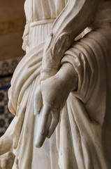 Historic buildings and monuments of Seville, Spain. hands. Statue. Marble.