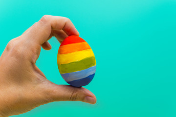 concept of LGBT. colorful egg in hand