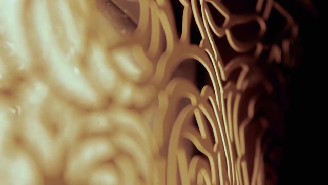 Abstract background of stenciled thin paper cardboard with panning motions