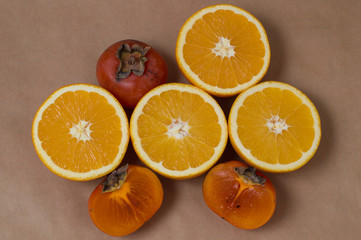 fresh oranges and persimmon