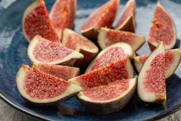 Fresh sliced figs on plate