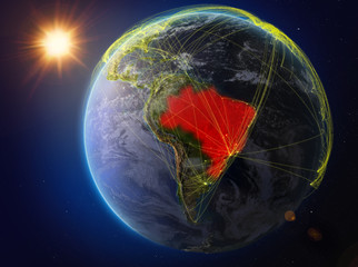 Brazil from space. Planet Earth with network representing international communication, technology and travel.