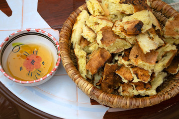 Flat bread and honey on a plate. National cuisine. Tunisia
