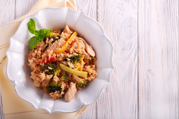 Chicken fillet with broccoli, pepper