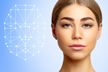 Biometric verification of young woman with face tracking technology. Face authentication