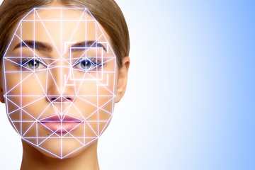 Biometric verification of young woman with face tracking technology. Face authentication