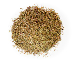 Pile of dried oregano leaves on a white. The view from the top.