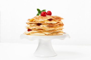 Pancake cake with raspberries