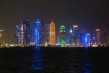 Obraz na płótnie Canvas Financial centre in Doha city at night, Qatar