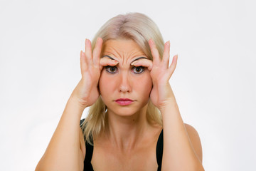 Fototapeta premium Face exercise finger brows