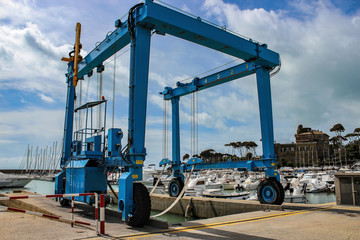 cranes for launching boats in the port
