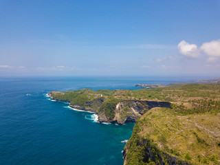 Aerial view of the ocean cliff near Kelingking beach located on the island of Nusa Penida, Indonesia