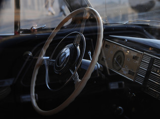 Steering wheel of a retro car in Kiev on October 28, 2018