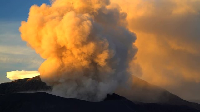 Erupting Mt Bromo summit at sunset a volcanic mountain Landscape Java 