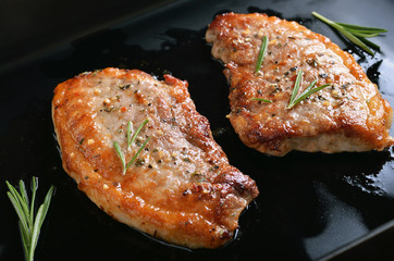 Grilled juicy pork steaks