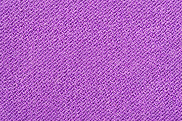 Pink fabric background texture. Detail of textile material close-up