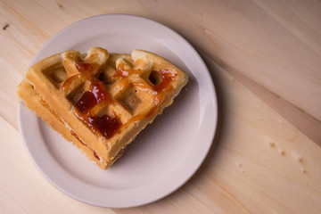 Waffles with jelly on a plate