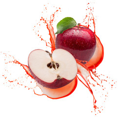 red apples in juice splash isolated on a white background