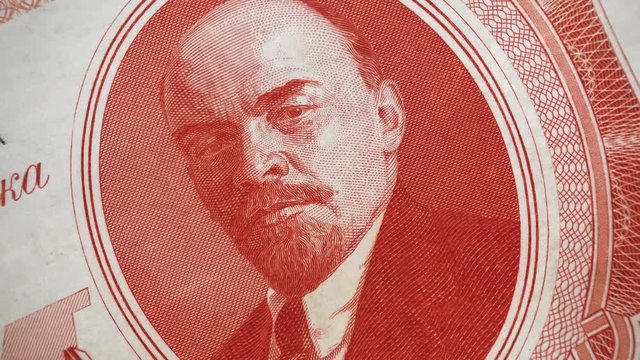Vladimir Lenin portrait on Russia rouble (1937) banknote rotating. Russian communist revolutionary, politician and marxism theorist, leader of Russian revolution 1917.  4K UHD video footage