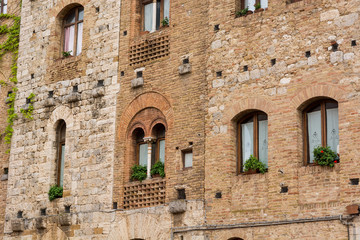 Fototapeta na wymiar Spectacular stone build facade of a medieval building.