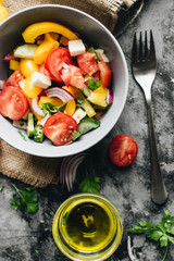 Delicious Greek salad or Horiatiki salad with ingredients
