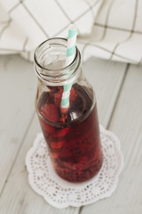 Delicious homemade raspberry lemonade with drinking straw