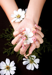 a woman's nail, designed with nail art