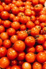 Pile of fresh ripe tomatoes, food background