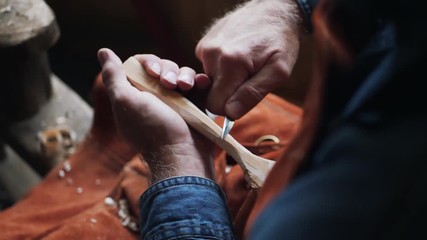 Top View of Craftsman Hand Carving Wooden Spoon