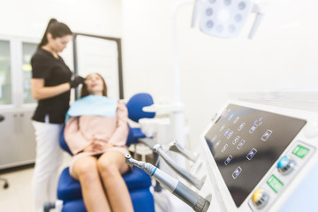 Fototapeta premium Dental clinic. Reception, examination of the patient. Teeth care. Modern dental equipment.