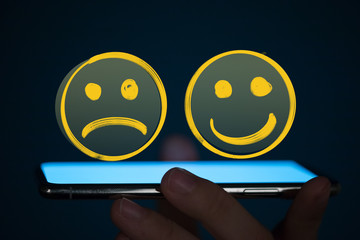 mood smiley in hand