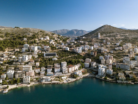 View of Saranda city and lekuresi hill with the castle on top captured with a drone. touristic attraction in Balkan . Ionian sea Mediterranean area. Sarande Albania 