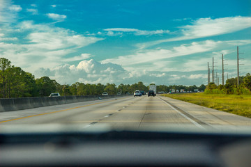 Day for travel on calm highway. Empty road.