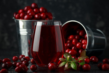 Fresh Cranberries juice in glass. Freshly made, organic, rustic style.