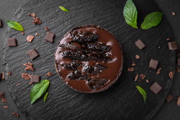 Chocolate cake with prunes and mint. Assorted Confectionery Range.