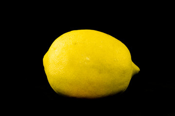 Fresh sliced lemon with black background