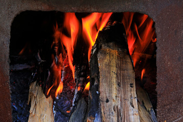 burning wood in a stove