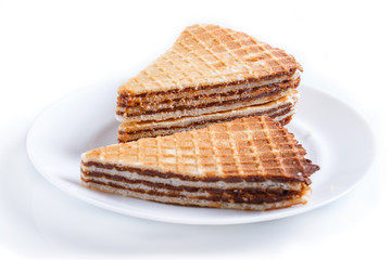 waffle sandwiches with boiled condensed milk in plate isolated on white background.