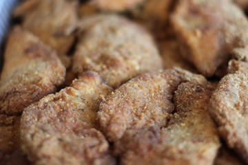 Closeup of fried chicken thighs