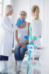 Obraz premium Medical equipment: blue stethoscope and tablet on white background. Medical equipment