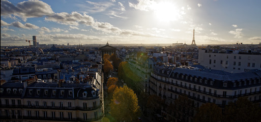 Paris, France - November 13, 2018: Madeleine church, Eiffel tower and Hausmann buildings viewed from Printemps rooftop
