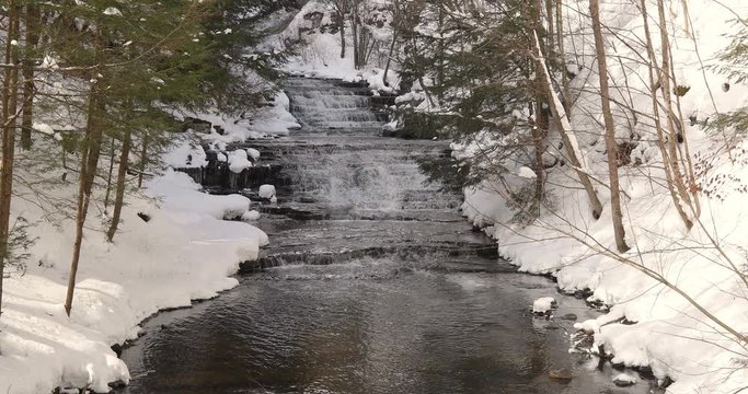 E.N. Huyck Preserve Waterfall after  winter snow storm
