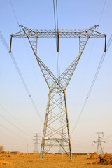 Electric power tower under the blue sky