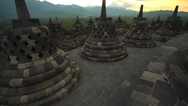 View of Borobudur at sunset a religious temple an ancient wonder Java
