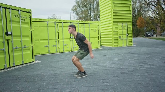 male teenager in a salto backwards in slow motion