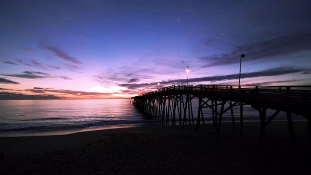 right before sunrise at the kure beach pier