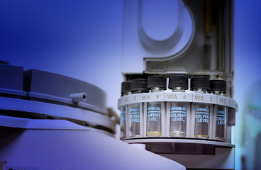Quality Control Laboratory medicine by equipment. Vials on autosampler of gas chromatography-mass spectrophotometer.