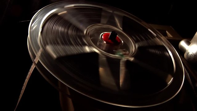 Film Reel Turning fast On Projector.