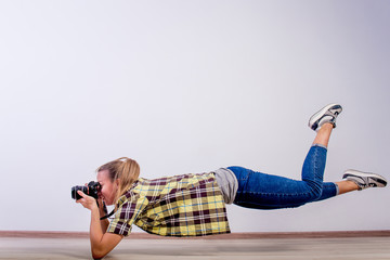 different photographer poses: bending, squatting, lying down